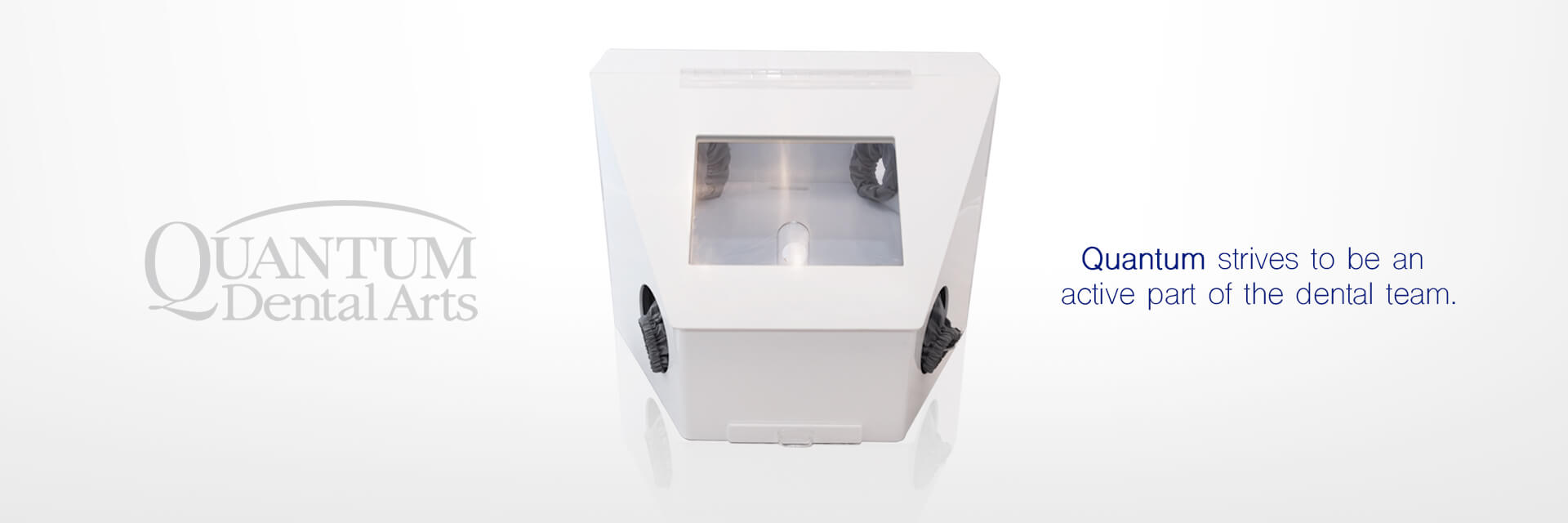 Quantum Dental Arts dental equipment with company logo and tagline: Quantum strives to be an active part of the dental team.